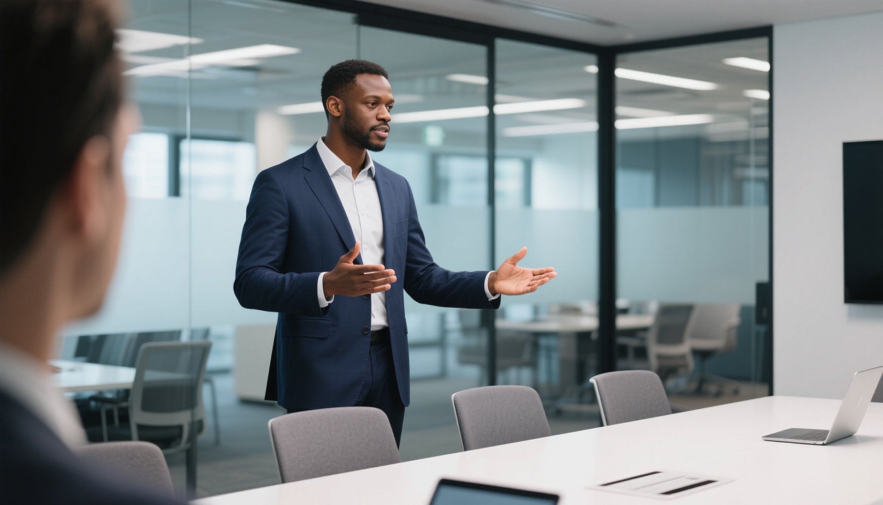 Professional man giving presentation in modern office